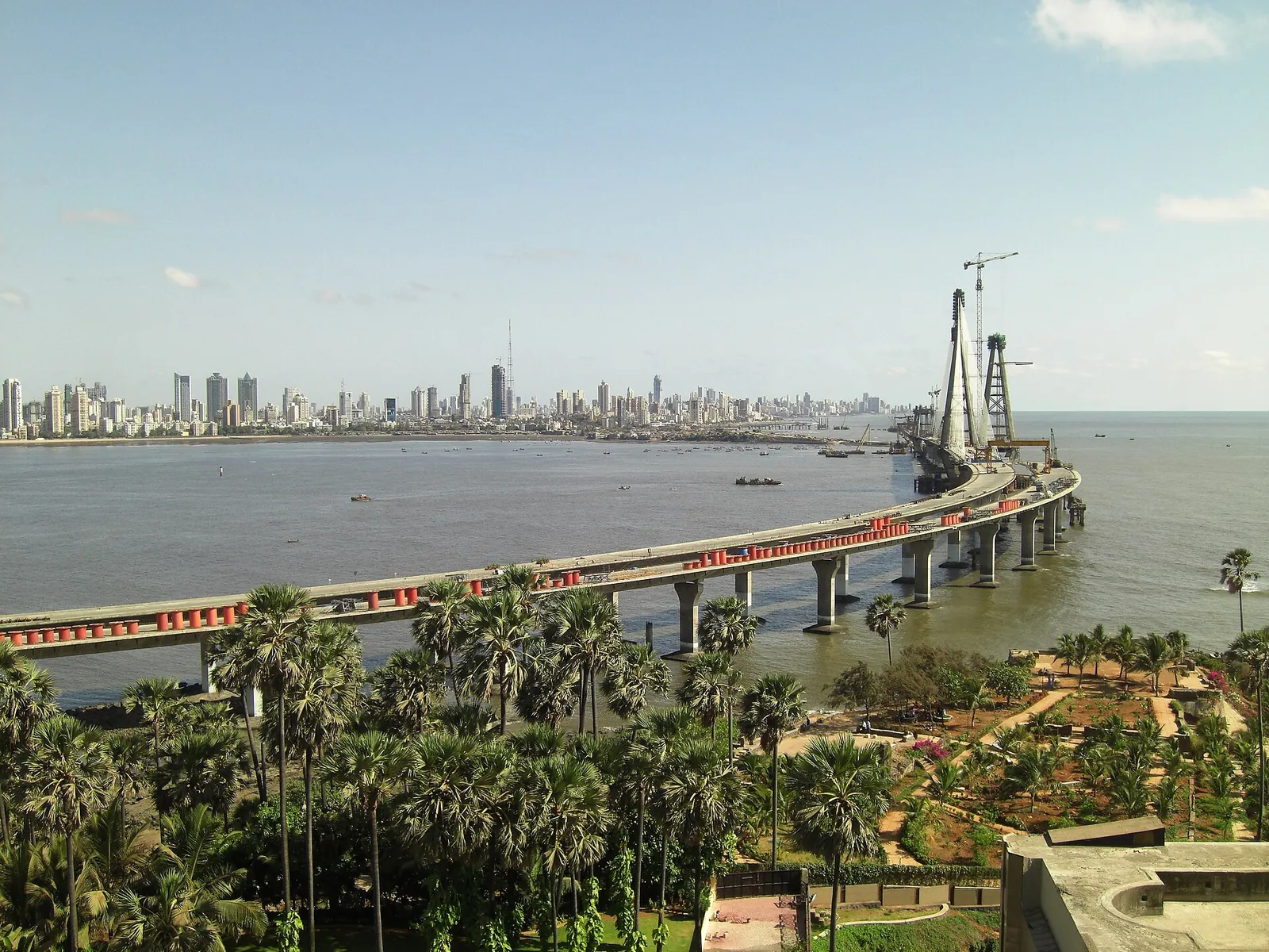 Aerial view of the Bandra waterfront and the Bandra–Worli Sea Link across the Arabian Sea at dusk, Mumbai